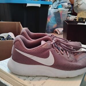 Nike Pink Athletic Shoes with Breathable Mesh and White Sole